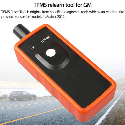 Orange TPMS reset tool for GM on a white background