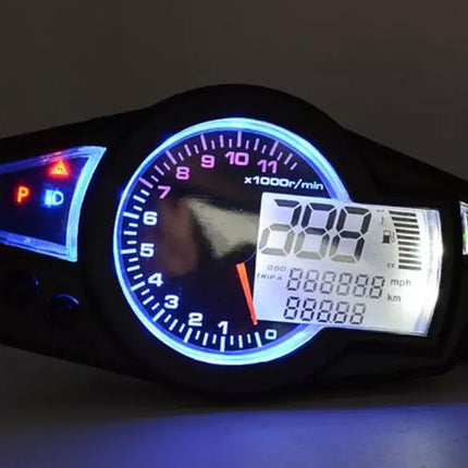 A motorcycle or scooter instrument cluster with a black faceplate, illuminated blue ring around the analog tachometer, and a white digital display screen on the right.