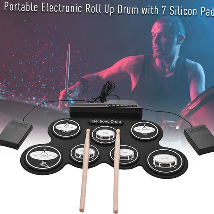 Portable electronic roll-up drum with 7 silicon pads and drumsticks on a white background