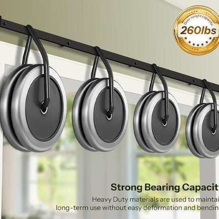 Four metal pots hanging on a rod with a strength rating label above them.
