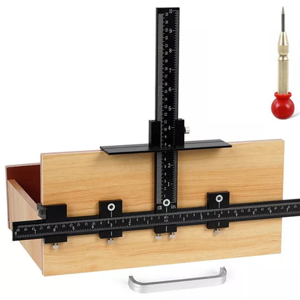 A wooden and black metal measuring jig or template tool with rulers, shown on a white background with a small red-handled screwdriver accessory.