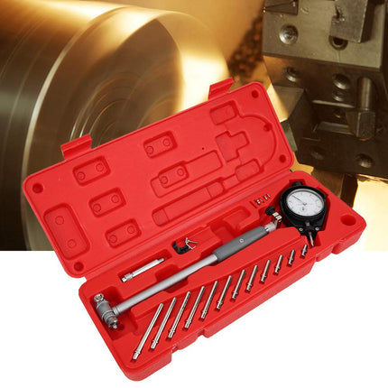 Red tool kit with measuring instruments on a white background
