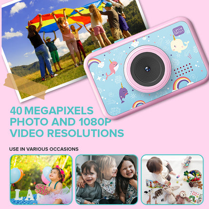 A pink and light blue children's digital camera with unicorn and rainbow illustrations, shown on a light pink background with promotional text and sample photo thumbnails.