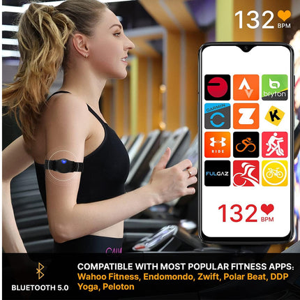 Woman on a treadmill with a fitness app on her phone showing heart rate and compatible apps.