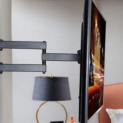 Wall-mounted TV with a flexible arm in a living room setting.