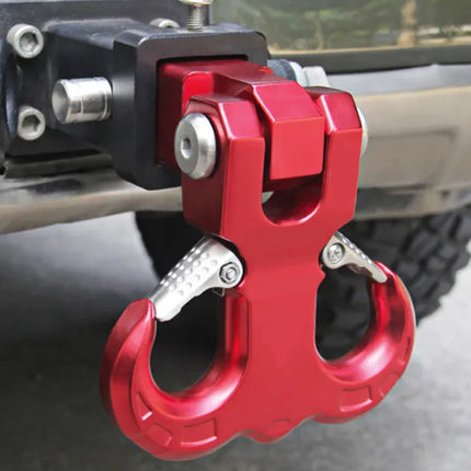 Red tow hook attached to a vehicle's hitch receiver