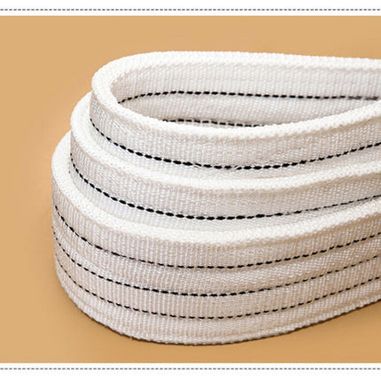White woven belt with black stitching on a beige background