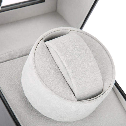 Gray car gear shift knob in a vehicle interior