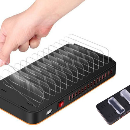 Hand holding a transparent screen protector above a black device with multiple slots.