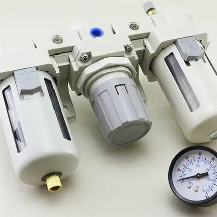 Mechanical filter assembly with a pressure gauge on a white background
