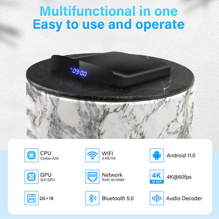 Black electronic device on a marble surface with text about its features.