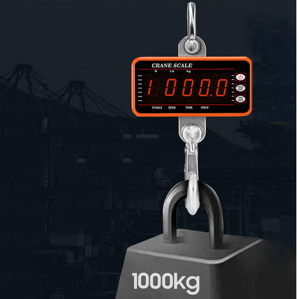 Digital crane scale with a dark background