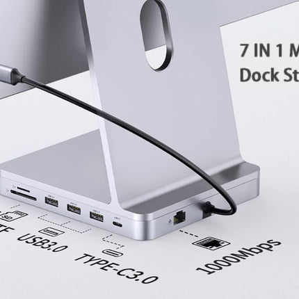 7-in-1 mini dock station with cable on a light gray background