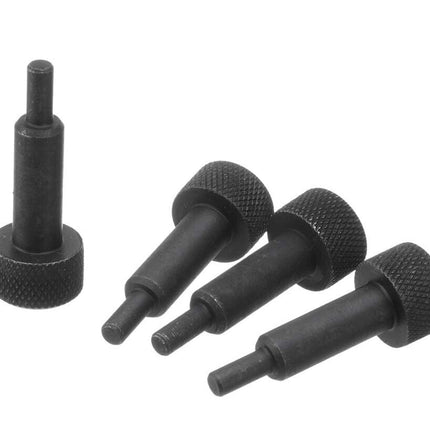 Four black metal alignment or adjustment pins with knurled textured ends, arranged on a plain white background.