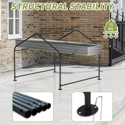 Metal bed frame with structural stability text and weight capacity indicator against a brick wall.