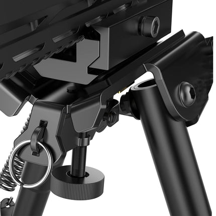 Close-up of a black camera tripod and monitor mount on a white background