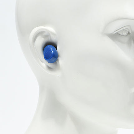 Blue earring on a white mannequin ear