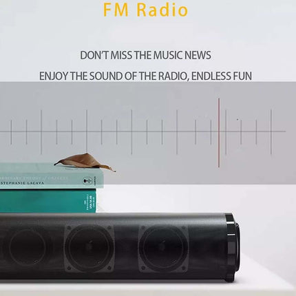 A black rectangular FM radio speaker with three visible circular drivers, placed on a white surface with stacked books behind it. Above the product, the text reads 'FM Radio' and 'DON'T MISS THE MUSIC NEWS / ENJOY THE SOUND OF THE RADIO, ENDLESS FUN' with a simple waveform graphic.