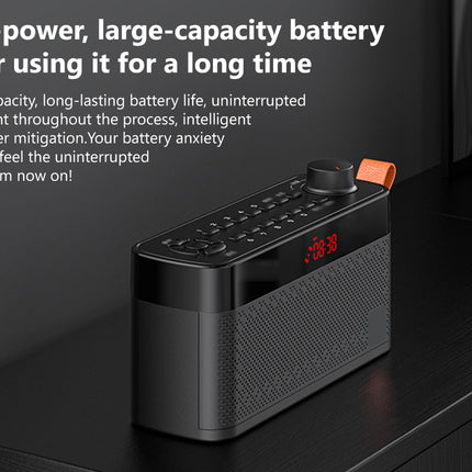 A black portable battery-powered speaker radio with a digital red LED clock and an orange loop handle, shown on a dark wooden surface with promotional text on the left.