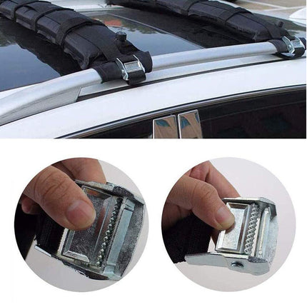 Car roof rack system with mounting brackets on a car, showing close-up of bracket attachment.