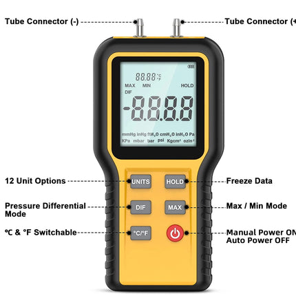 A handheld digital tube gauge with a yellow and black body, featuring a backlit LCD screen and labeled buttons, shown on a white background with callout lines pointing to features like tube connectors, units, pressure differential mode, temperature switchable, freeze data, and manual power on.