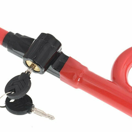Red bike lock with black key holder on a white background