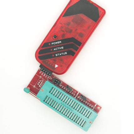 A red electronic diagnostic tool with a black status panel and a separate teal breadboard connector module, shown on a plain white background.