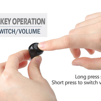 Small black switch being pressed by a finger with text on one key operation and switch volume.