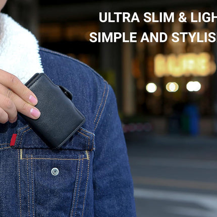 Person holding a black wallet with text 'Ultra slim & light, simple and stylish' in an urban setting.