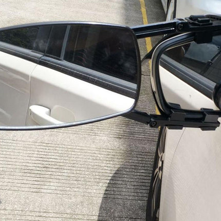 Car side mirror on a vehicle with a clear background