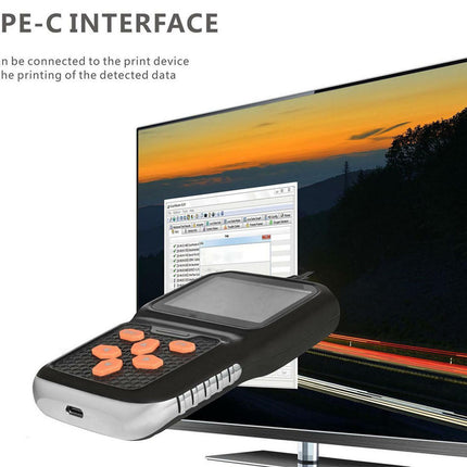 Handheld device with Type-C interface connected to a monitor displaying a scenic wallpaper.