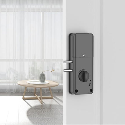 Modern electronic door lock on a white door with a blurred room in the background
