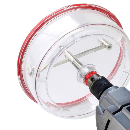Close-up of a power drill with a sanding disc on a white background