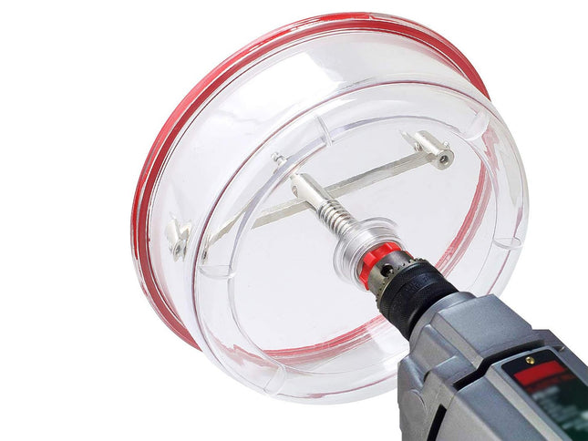 Close-up of a power drill with a sanding disc on a white background