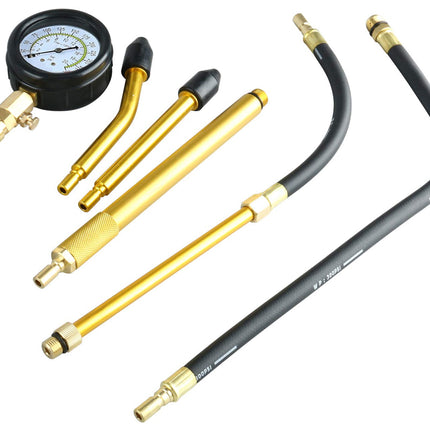 Set of automotive pressure testing tools with hoses and gauge on a white background