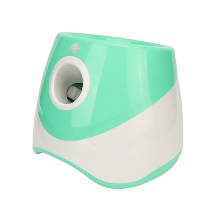 Green and white pencil sharpener on a white background