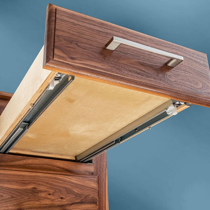 Wooden cabinet with an open door on a blue background