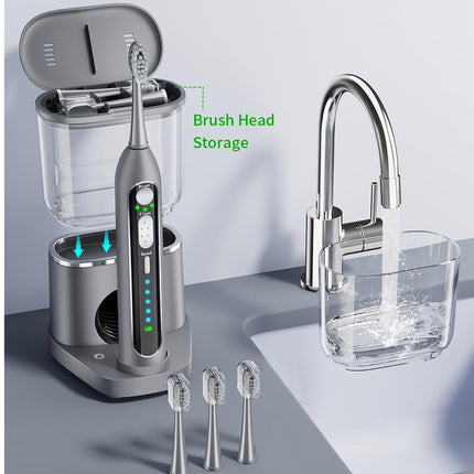 Electric toothbrush set with brush head storage and water faucet on a gray surface.