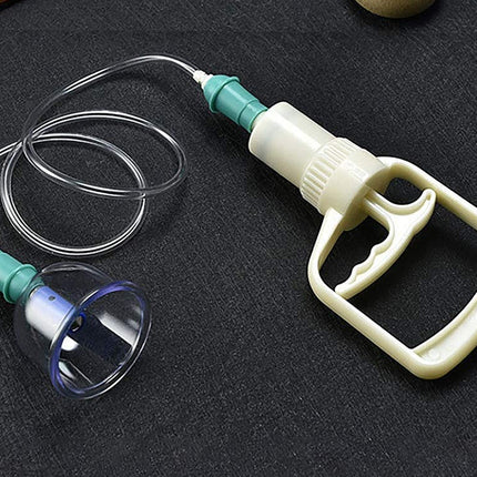 White and blue vacuum pump device on a dark surface