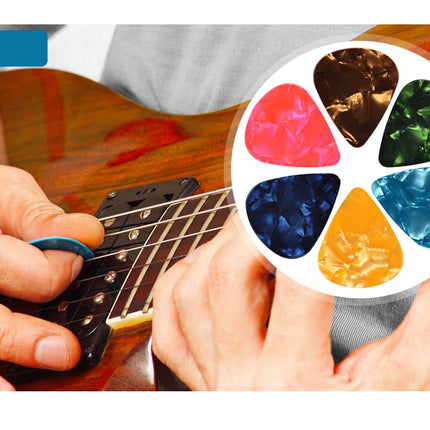 Person holding a guitar with a close-up of colorful guitar picks.