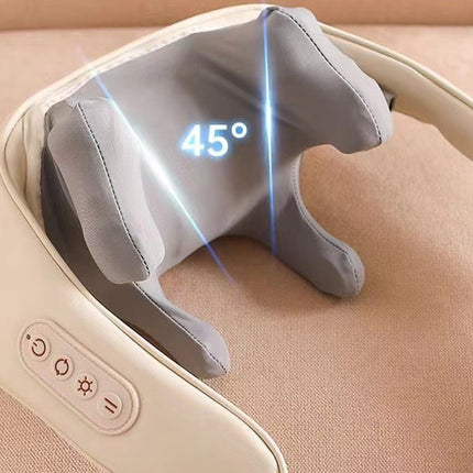 Neck and shoulder massager with digital display on a beige surface