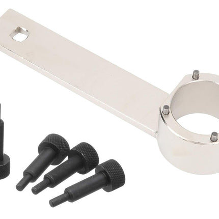 Metallic tool with four black cylindrical components on a white background