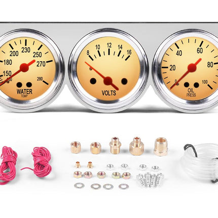 Three automotive gauges with accessories on a white background