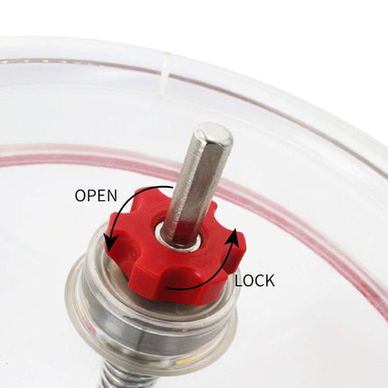 Close-up of a red valve with 'Open' and 'Lock' labels on a clear background