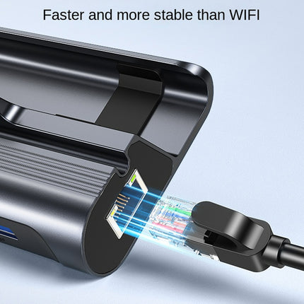 A close-up of a black electronic hub or adapter with a cable plugged into it, shown on a light blue background with the text 'Faster and more stable than WIFI' at the top.