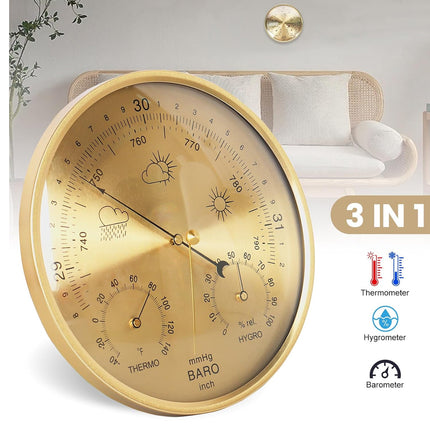 Gold 3-in-1 weather station with thermometer, barometer, and hygrometer on a white background.