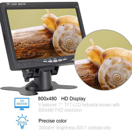Small monitor displaying a snail on a log with technical specifications below.