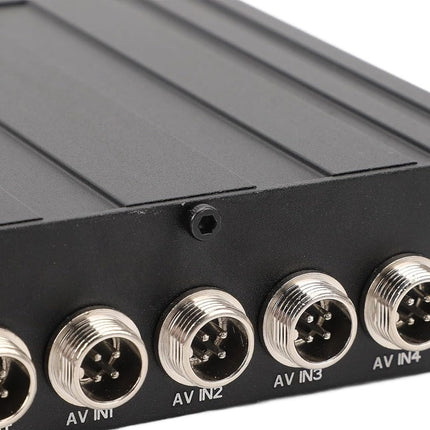 Black electronic module with multiple input connectors on a white background