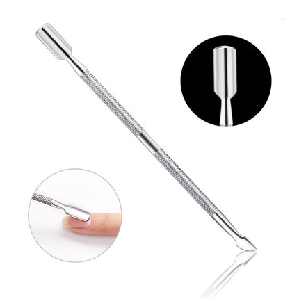 Metal tool with pointed end and textured surface on a white background