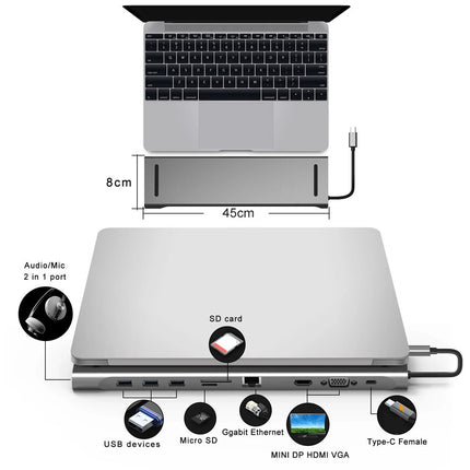 A silver laptop extension dock shown on a white background, with a laptop plugged into it. The image includes dimension labels (8cm and 45cm) and callout icons for ports and connected devices such as audio/Mic, SD card, USB devices, Micro SD, Gigabit Ethernet, Mini DP HDMI VGA, and Type-C Female.